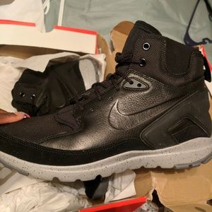Grey and black boot